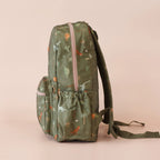 side view with pockets on Fox & Fallow backpack for kids, perfect for school, daycare and everyday use. Spacious, practical and designed for little adventures. Personalisation of embroidery with name also available on bags in 2 placements. This print is dinos