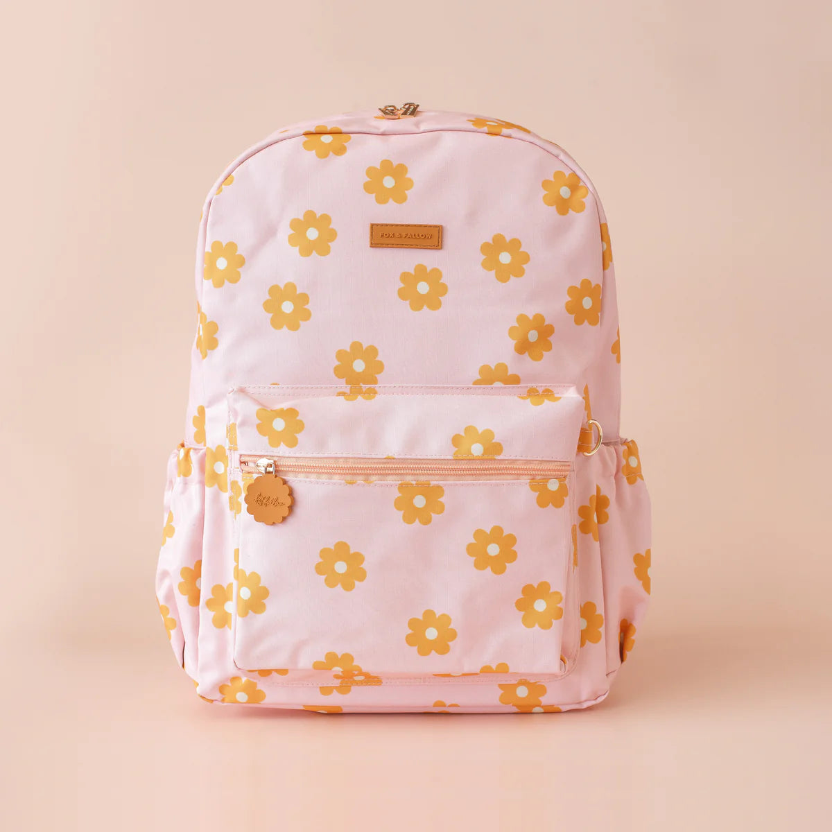 front on view of Fox & Fallow backpack for kids, perfect for school, daycare and everyday use. Spacious, practical and designed for little adventures. Personalisation of embroidery with name also available on bags in 2 placements. This print is daisy chain