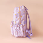 side view pockets of Fox & Fallow backpack for kids, perfect for school, daycare and everyday use. Spacious, practical and designed for little adventures. Personalisation of embroidery with name also available on bags in 2 placements. This print is unicorns