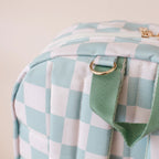 handle close up view Fox & Fallow sage check backpack kids school bag