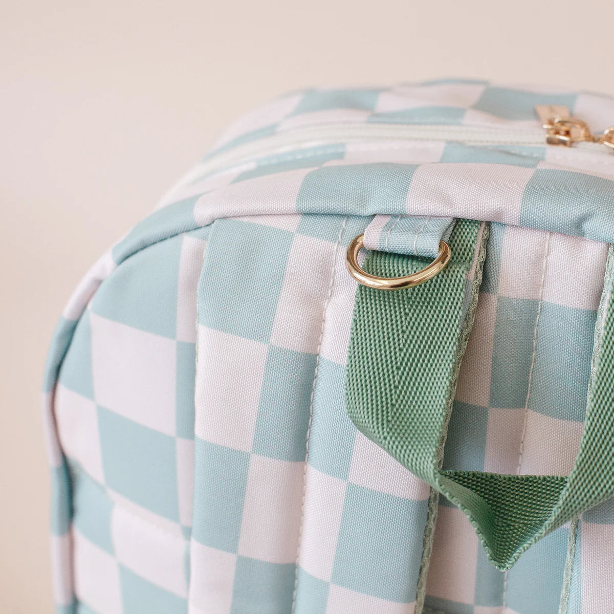 handle close up view Fox & Fallow sage check backpack kids school bag