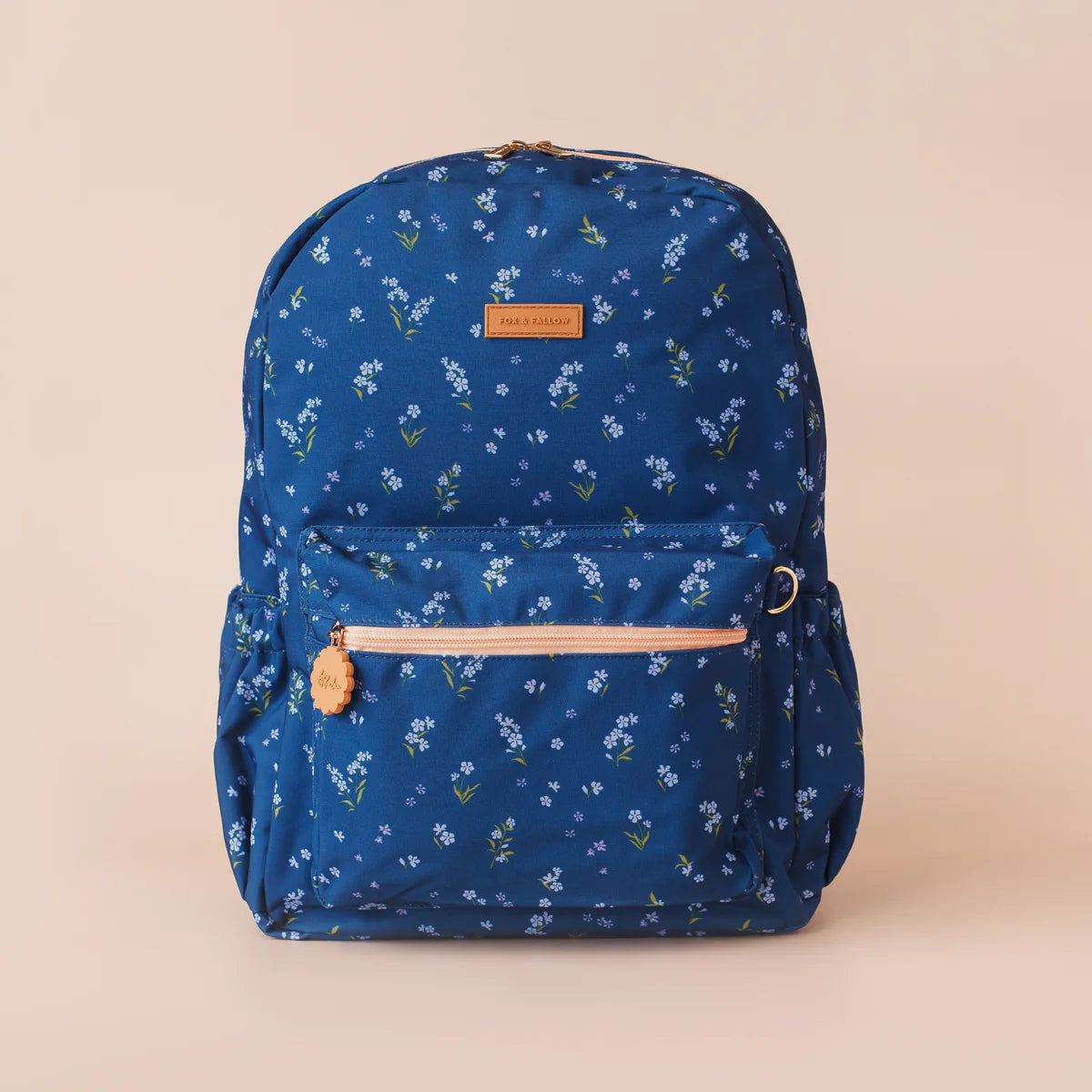 front view of Fox & Fallow backpack for kids, perfect for school, daycare and everyday use. Spacious, practical and designed for little adventures. Personalisation of embroidery with name also available on bags in 2 placements. This print is forget me not