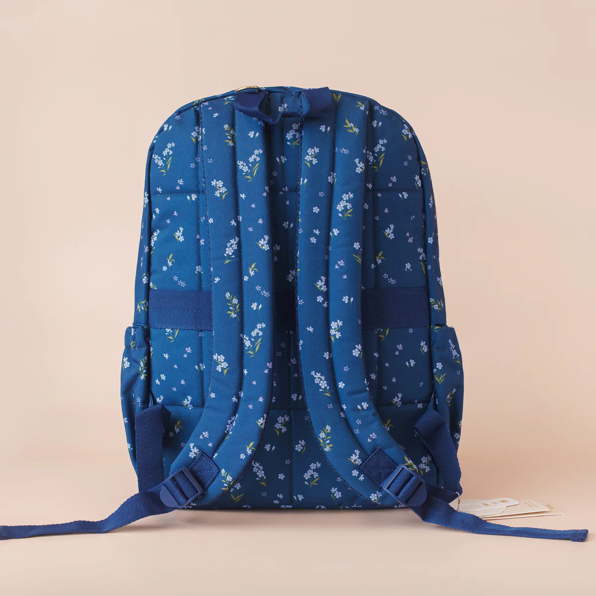 back view of Fox & Fallow backpack for kids, perfect for school, daycare and everyday use. Spacious, practical and designed for little adventures. Personalisation of embroidery with name also available on bags in 2 placements. This print is forget me not