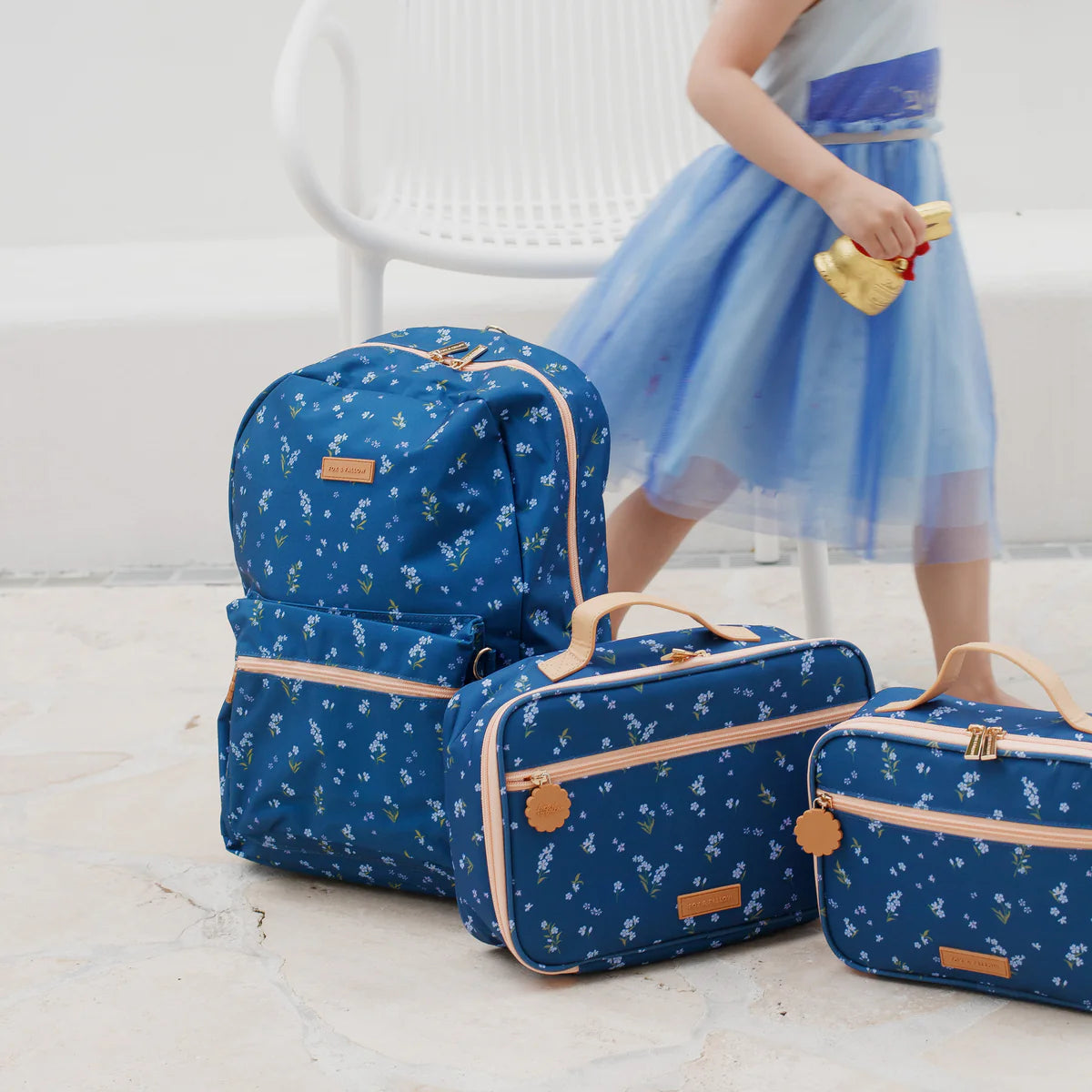 collection of Fox & Fallow backpack for kids, perfect for school, daycare and everyday use. Spacious, practical and designed for little adventures. Personalisation of embroidery with name also available on bags in 2 placements. This print is forget me not with matching lunch bags