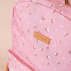 close up of logo modelling the Fox & Fallow backpack for kids, perfect for school, daycare and everyday use. Spacious, practical and designed for little adventures. Personalisation of embroidery with name also available on bags in 2 placements. This print is dusty roses
