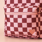 close up front pocket view of Fox & Fallow backpack for kids, perfect for school, daycare and everyday use. Spacious, practical and designed for little adventures. Personalisation of embroidery with name also available on bags in 2 placements. This print is cherry check