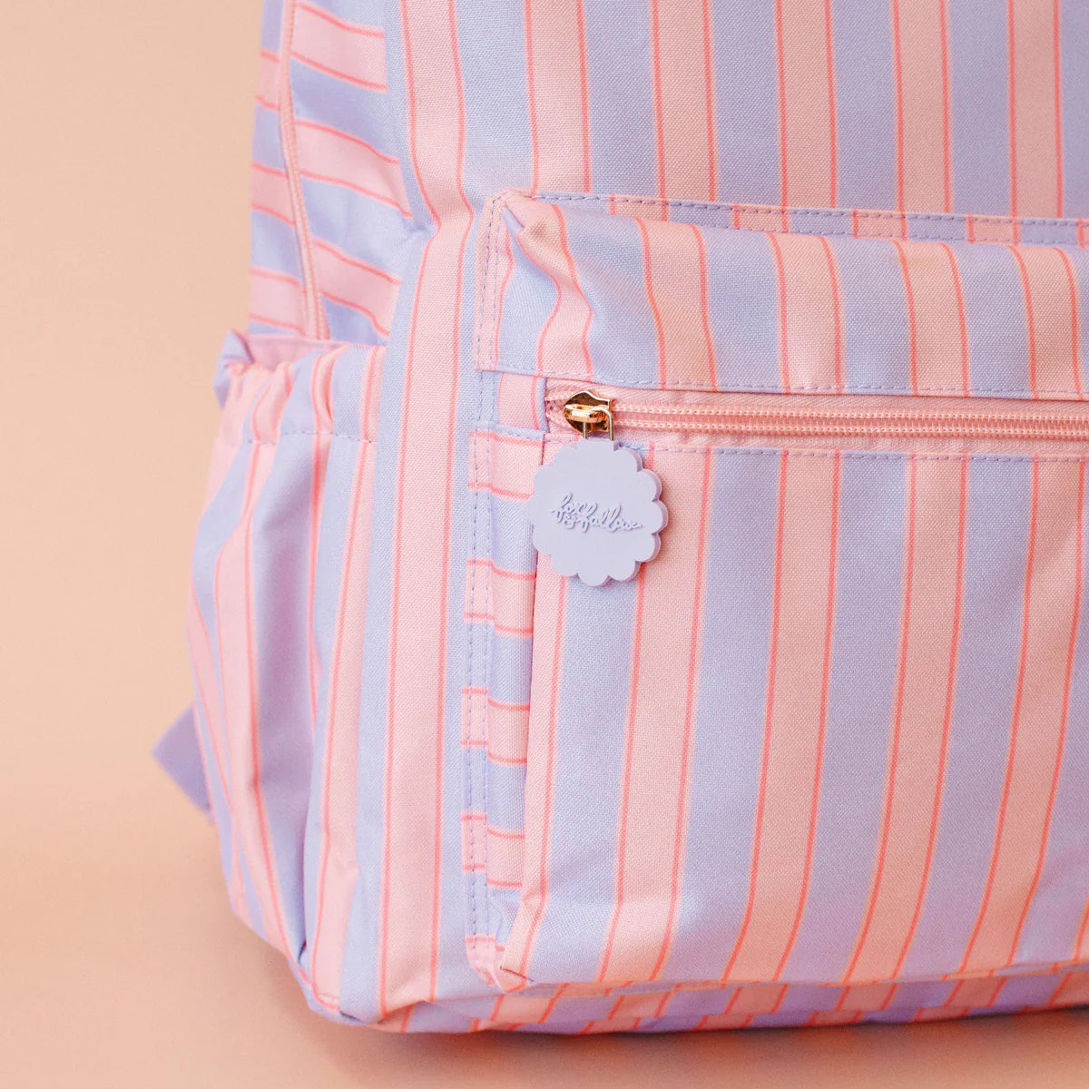 close up view of Fox & Fallow backpack for kids, perfect for school, daycare and everyday use. Spacious, practical and designed for little adventures. Personalisation of embroidery with name also available on bags in 2 placements. This print is powder stripe