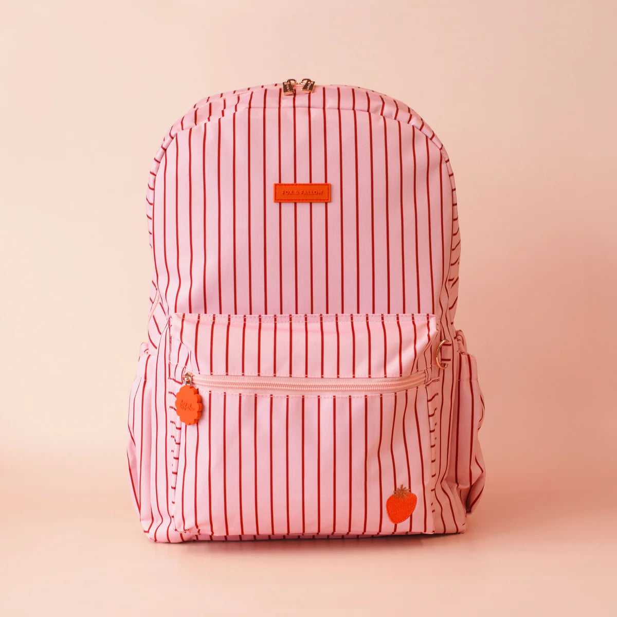 fronton view of Fox & Fallow backpack for kids, perfect for school, daycare and everyday use. Spacious, practical and designed for little adventures. Personalisation of embroidery with name also available on bags in 2 placements. This print is strawberry stripe