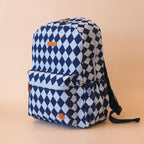 side view of Fox & Fallow backpack for kids, perfect for school, daycare and everyday use. Spacious, practical and designed for little adventures. Personalisation of embroidery with name also available on bags in 2 placements. This print is blue diamonds