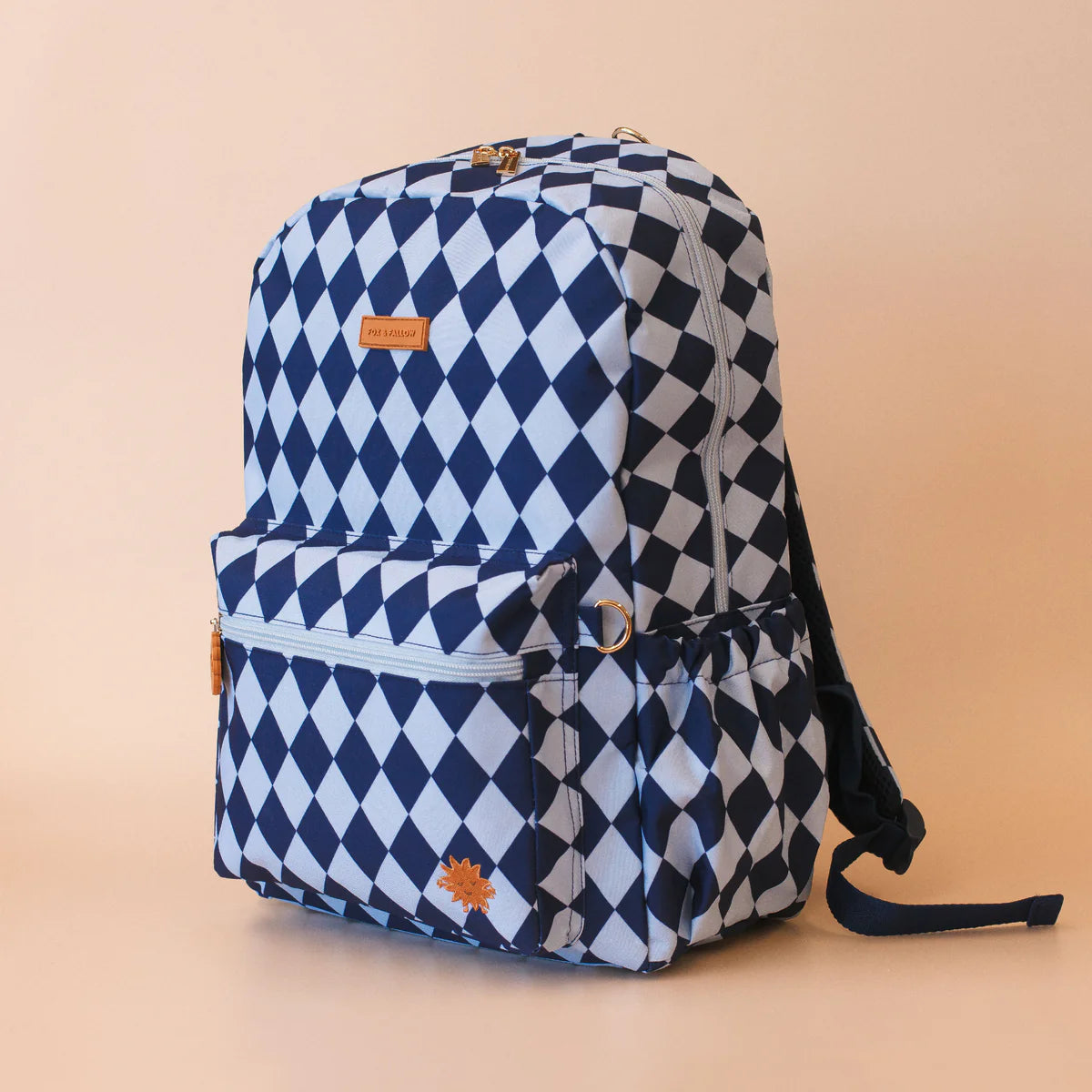 side view of Fox & Fallow backpack for kids, perfect for school, daycare and everyday use. Spacious, practical and designed for little adventures. Personalisation of embroidery with name also available on bags in 2 placements. This print is blue diamonds