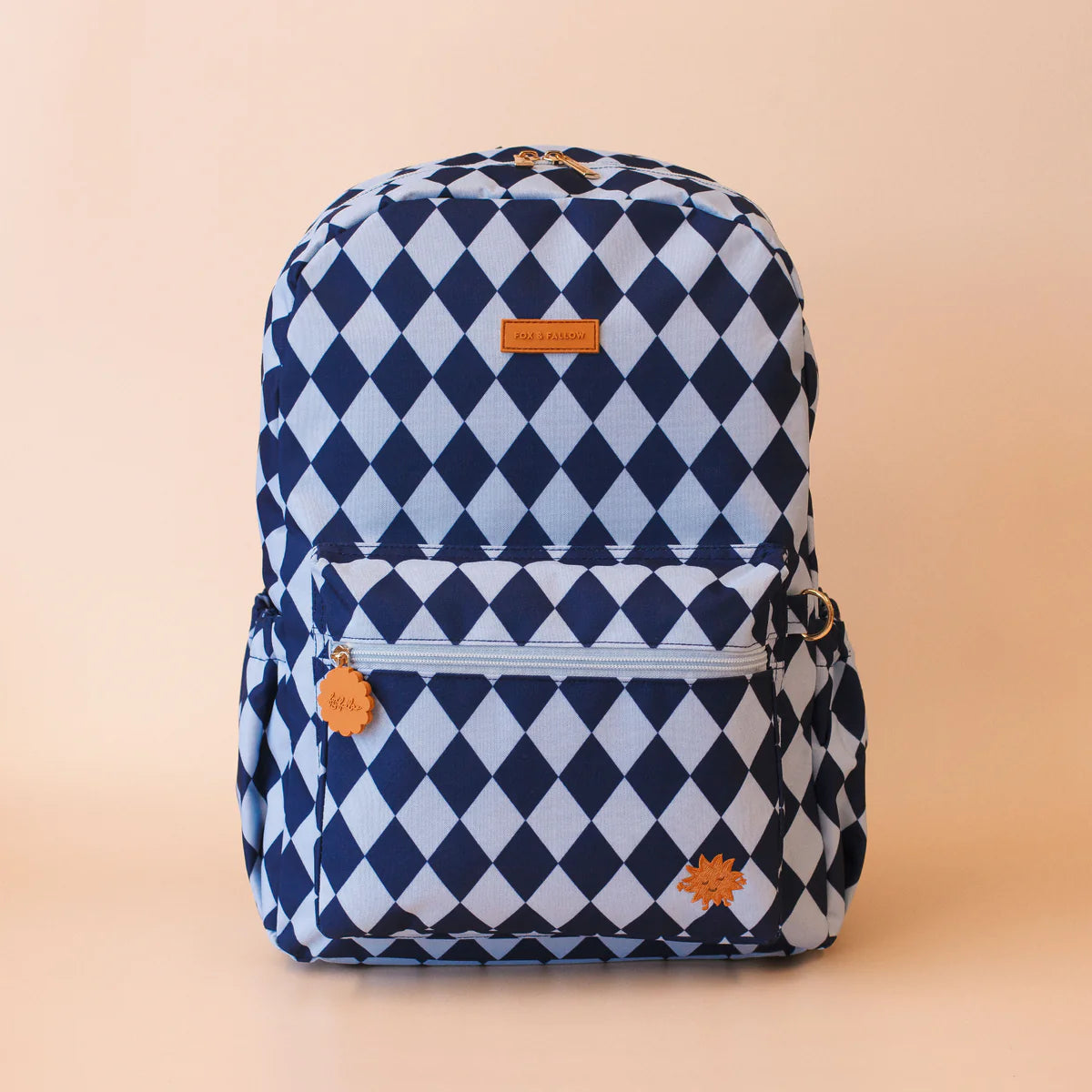 front view of Fox & Fallow backpack for kids, perfect for school, daycare and everyday use. Spacious, practical and designed for little adventures. Personalisation of embroidery with name also available on bags in 2 placements. This print is blue diamonds