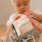 soft busy cube with buttons zips and snaps fine motor toy for toddlers