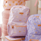 front view of Fox & Fallow backpack for kids, perfect for school, daycare and everyday use. Spacious, practical and designed for little adventures. Personalisation of embroidery with name also available on bags in 2 placements. This print is unicorns, juniper and daisy chain