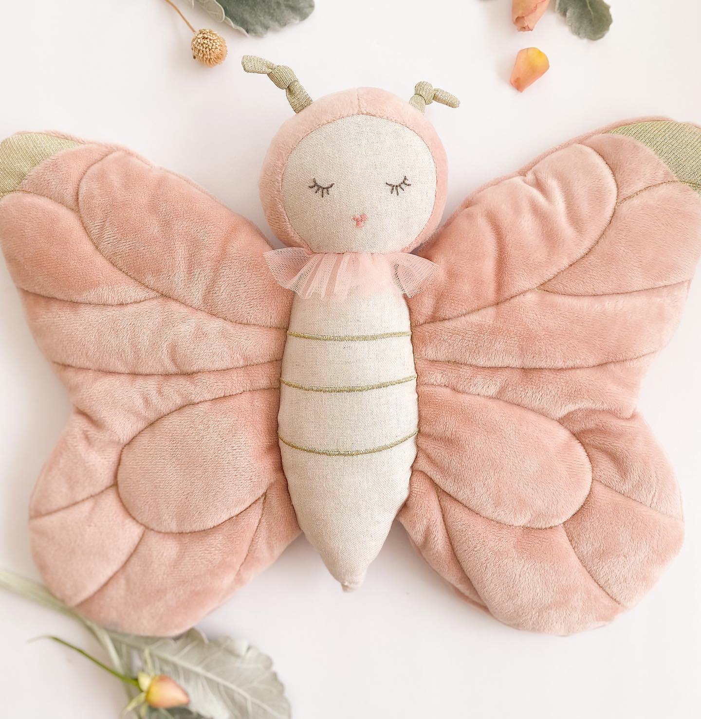 Soft butterfly stuffed toy with velvety pink wings by Mon Ami