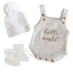 Blossom and Pear newborn announcement outfit with Hello World knit romper and matching beanie accessories