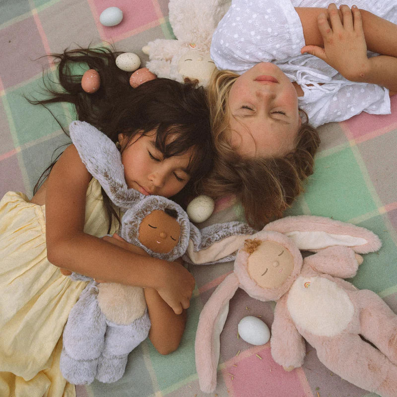 brown skin tone bunny doll with embroidered face and soft plush body