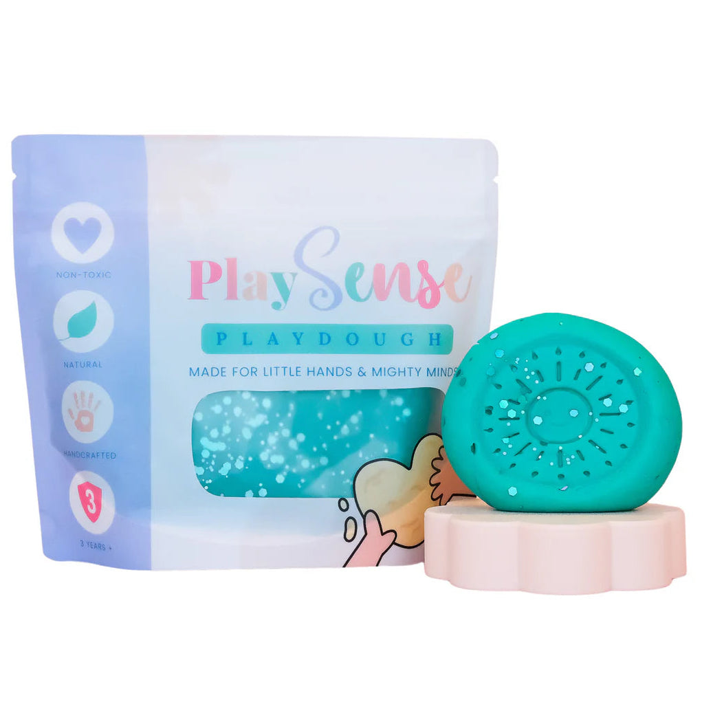 Image of dough by the brand playsense. Great for sensory play and being creative, also fine motor development. Dough is non toxic with all natural ingredients so safe for little hands. Colour and scent glitter teal sour lolly