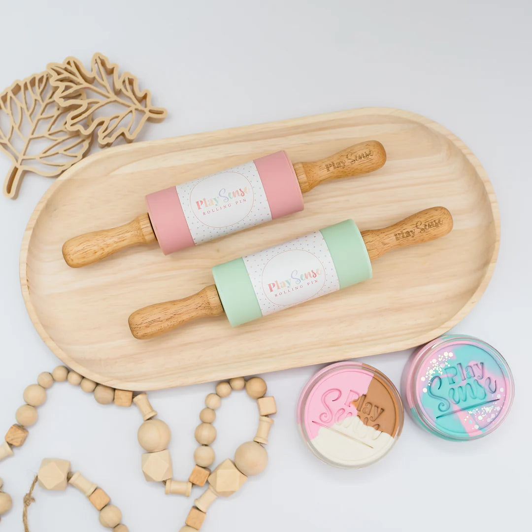 brand Playsense Dough Roller, the perfect tool for both playdough fun and beginner baking. pictured is mint and pink 