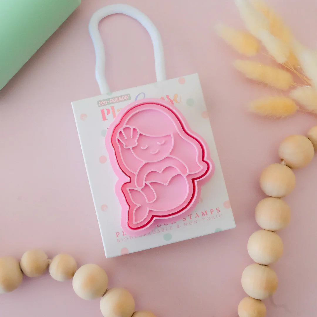 photoshoot of image of playdough/clay stamp and cutter. Eco-friendly sensory play tool by brand playsense perfect for creative and imaginative play. can also be used for cookies and baking. pictured is mermaid