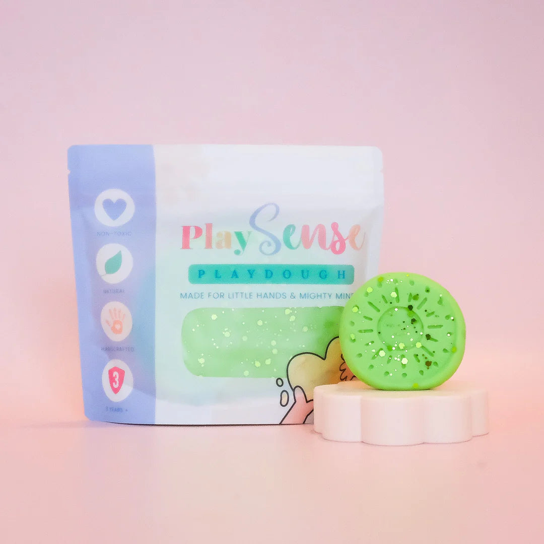 Image of dough by the brand playsense. Great for sensory play and being creative, also fine motor development. Dough is non toxic with all natural ingredients so safe for little hands. Colour and scent is glitter pastel green fresh cucumber