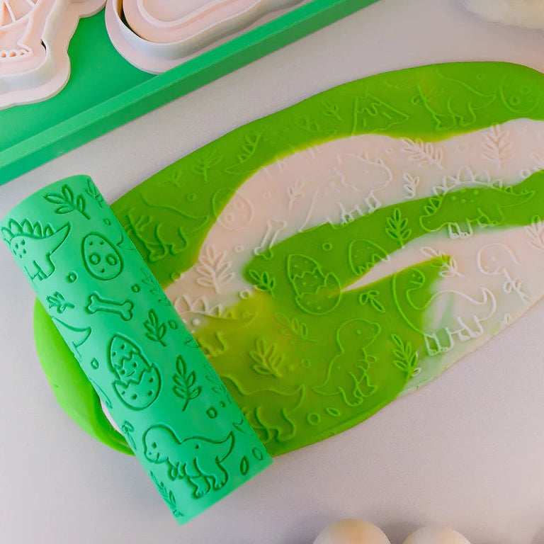 how to use Image of eco textured dough roller designed with fun patterns and to be used with sensory like playdough or can be used for cooking dough. Textured roller is in the pattern dinosaur