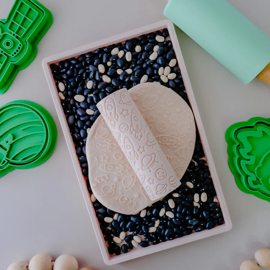 Image of eco textured dough roller designed with fun patterns and to be used with sensory like playdough or can be used for cooking dough. Textured roller is in the pattern space