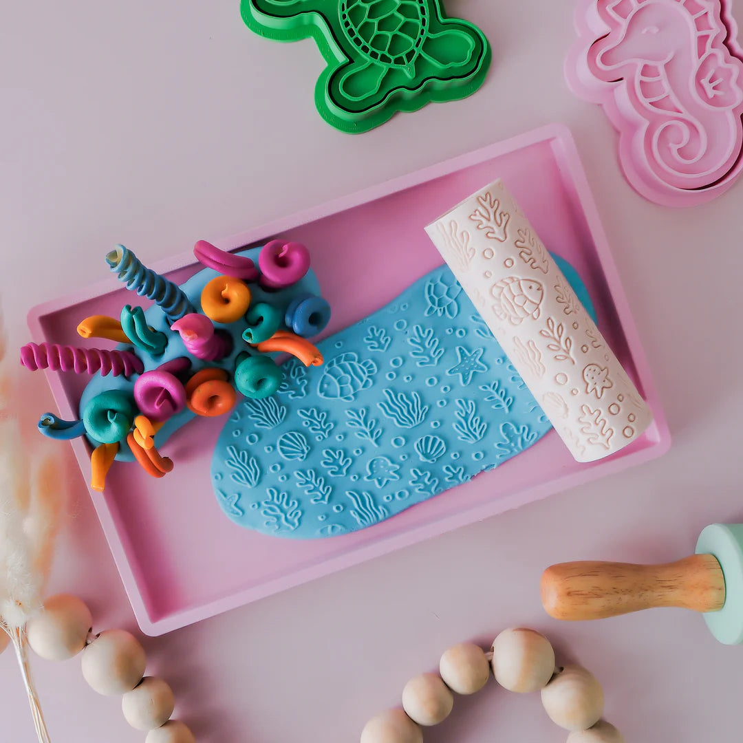 Image of eco textured dough roller designed with fun patterns and to be used with sensory like playdough or can be used for cooking dough. Textured roller is in the pattern ocean life