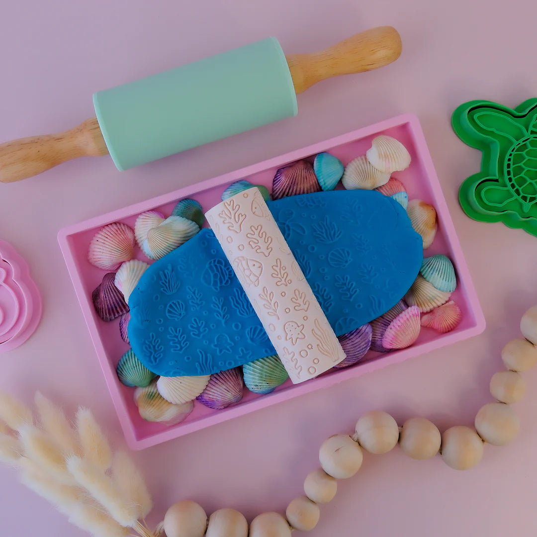 Image of eco textured dough roller designed with fun patterns and to be used with sensory like playdough or can be used for cooking dough. Textured roller is in the pattern ocean life