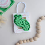 photoshootimage of playdough/clay stamp and cutter. Eco-friendly sensory play tool by brand playsense perfect for creative and imaginative play. can also be used for cookies and baking. pictured is centipede