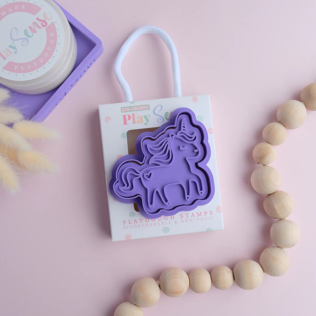 photoshoot of image of playdough/clay stamp and cutter. Eco-friendly sensory play tool by brand playsense perfect for creative and imaginative play. can also be used for cookies and baking. pictured is unicorn