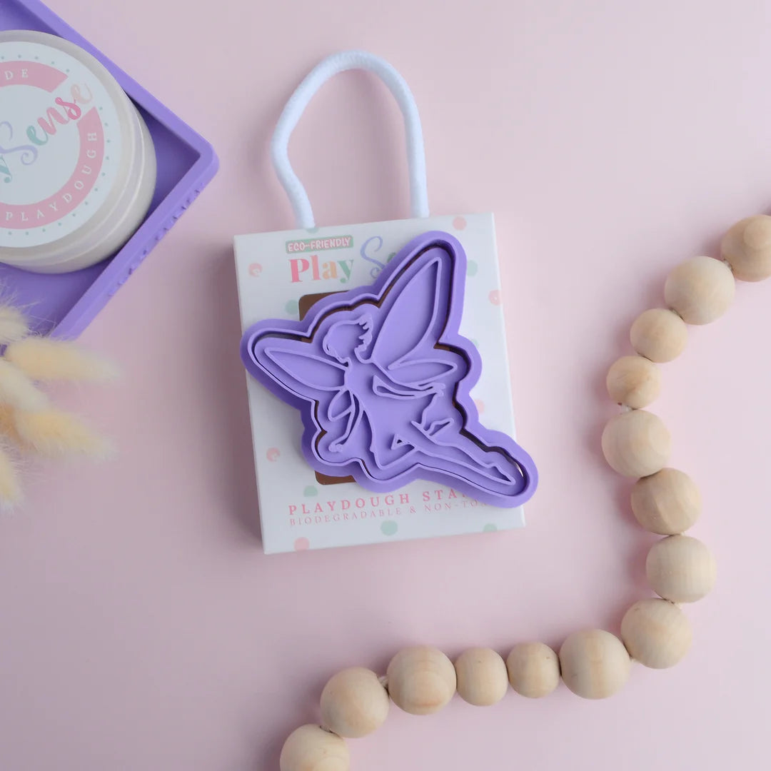 photoshoot image of playdough/clay stamp and cutter. Eco-friendly sensory play tool by brand playsense perfect for creative and imaginative play. can also be used for cookies and baking. pictured is fairy