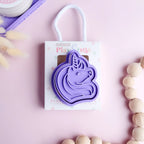 photoshoot image of playdough/clay stamp and cutter. Eco-friendly sensory play tool by brand playsense perfect for creative and imaginative play. can also be used for cookies and baking. pictured is magic unicorn