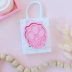  photoshoot image of playdoughc/clay stamp and cutter. Eco-friendly sensory play tool perfect for creative and imaginative play. can also be used for cookies and baking. pictured is balloons