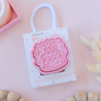 photoshoot of playdoughc/clay stamp and cutter. Eco-friendly sensory play tool perfect for creative and imaginative play. can also be used for cookies and baking. pictured is party cake