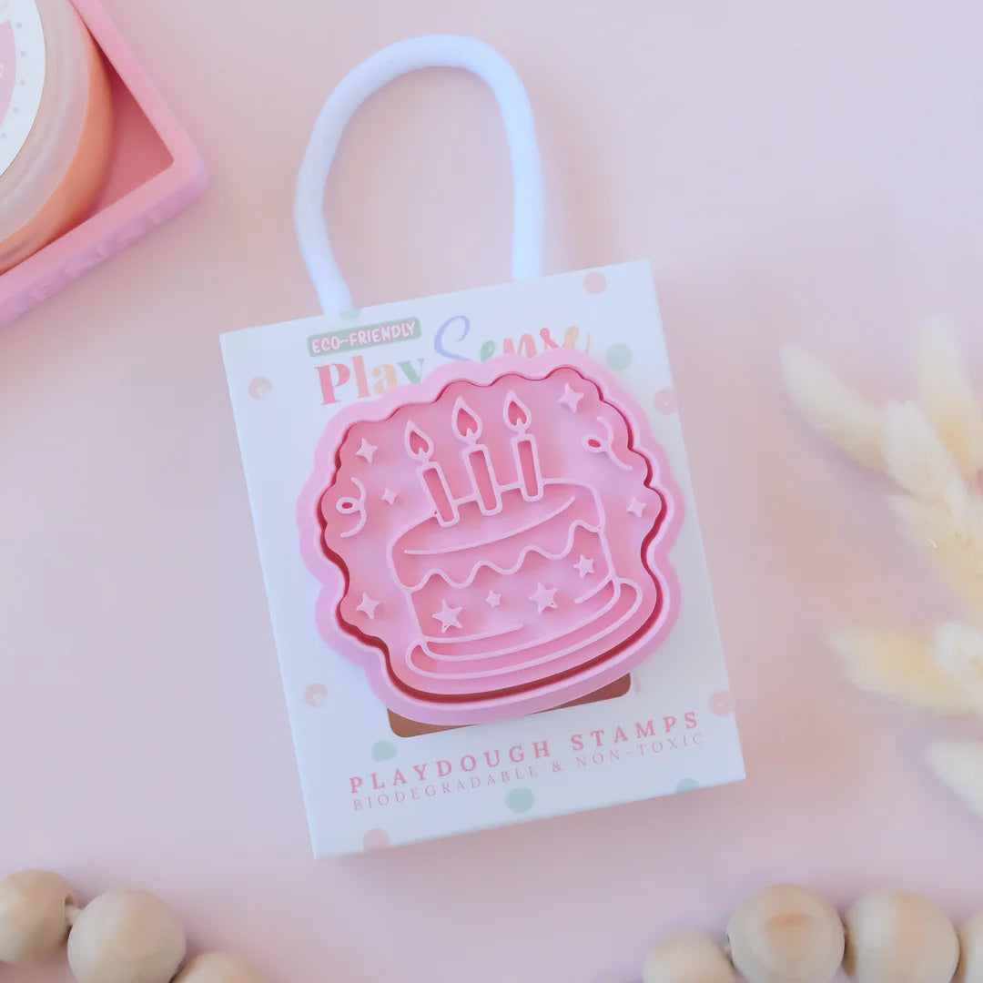 photoshoot of playdoughc/clay stamp and cutter. Eco-friendly sensory play tool perfect for creative and imaginative play. can also be used for cookies and baking. pictured is party cake