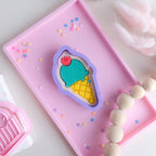 showing compelted look image of playdough/clay stamp and cutter. Eco-friendly sensory play tool by brand playsense perfect for creative and imaginative play. can also be used for cookies and baking. pictured is ice cream