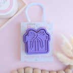 photoshoot image of playdough/clay stamp and cutter. Eco-friendly sensory play tool by brand playsense perfect for creative and imaginative play. can also be used for cookies and baking. pictured is present