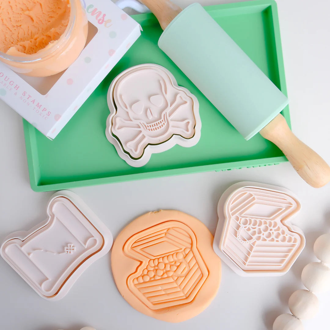 trio pirate stamp and cutter image of playdough/clay stamp and cutter. Eco-friendly sensory play tool by brand playsense perfect for creative and imaginative play. can also be used for cookies and baking. pictured is skull and bones,treasure chest and treasure map 