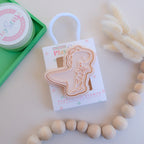 photoshoot image of playdough/clay stamp and cutter. Eco-friendly sensory play tool by brand playsense perfect for creative and imaginative play. can also be used for cookies and baking. pictured is t-rex dinosaur