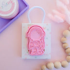 photoshoot image of playdoughc/clay stamp and cutter. Eco-friendly sensory play tool perfect for creative and imaginative play. can also be used for cookies and baking. pictured is astronaut explorer