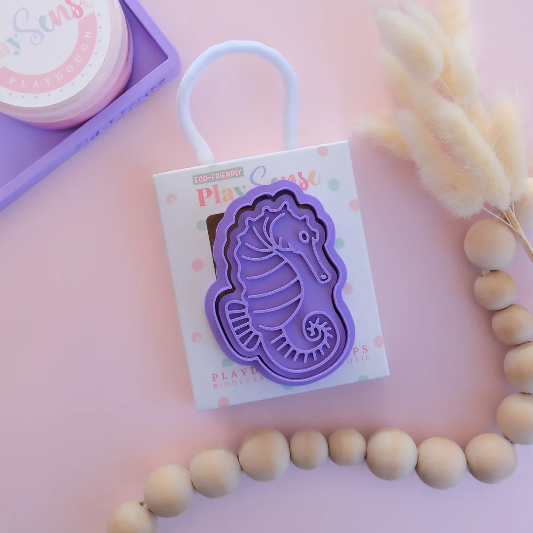 photoshoot image of playdough/clay stamp and cutter. Eco-friendly sensory play tool by brand playsense perfect for creative and imaginative play. can also be used for cookies and baking. pictured is seahorse