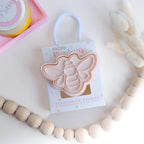 photoshoot image of playdough/clay stamp and cutter. Eco-friendly sensory play tool by brand playsense perfect for creative and imaginative play. can also be used for cookies and baking. pictured is bumble bee