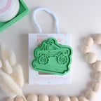 photoshoot image of playdough/clay stamp and cutter. Eco-friendly sensory play tool by brand playsense perfect for creative and imaginative play. can also be used for cookies and baking. pictured is monster truck