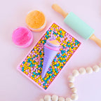 photoshoot of colourful rainbow 3d printed eco ice cream cone for sensory play with clay, playdough, dough and more. brand is playsense. these are fun for kids. pictures is colours purple