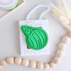 photoshoot image of playdough/clay stamp and cutter. Eco-friendly sensory play tool by brand playsense perfect for creative and imaginative play. can also be used for cookies and baking. pictured is a rocket blasting off a planet called blast off
