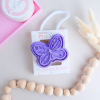 photoshoot of  of playdoughc/clay stamp and cutter. Eco-friendly sensory play tool perfect for creative and imaginative play. can also be used for cookies and baking. pictured is butterfly