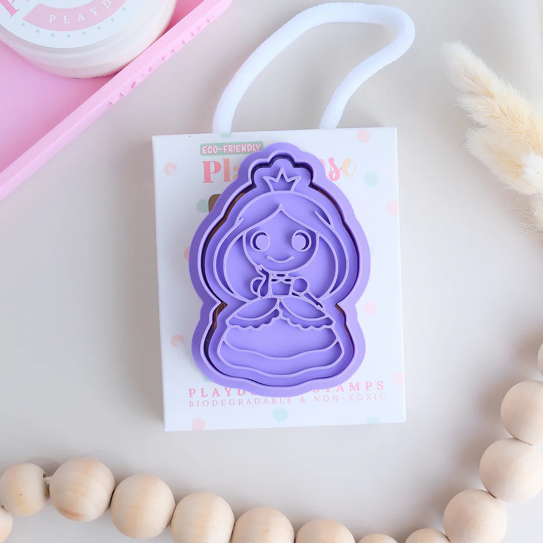 photoshoot image of playdough/clay stamp and cutter. Eco-friendly sensory play tool by brand playsense perfect for creative and imaginative play. can also be used for cookies and baking. pictured is princess
