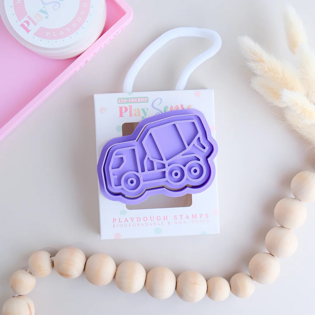 photoshoot image of playdough/clay stamp and cutter. Eco-friendly sensory play tool by brand playsense perfect for creative and imaginative play. can also be used for cookies and baking. pictured is a cement truck