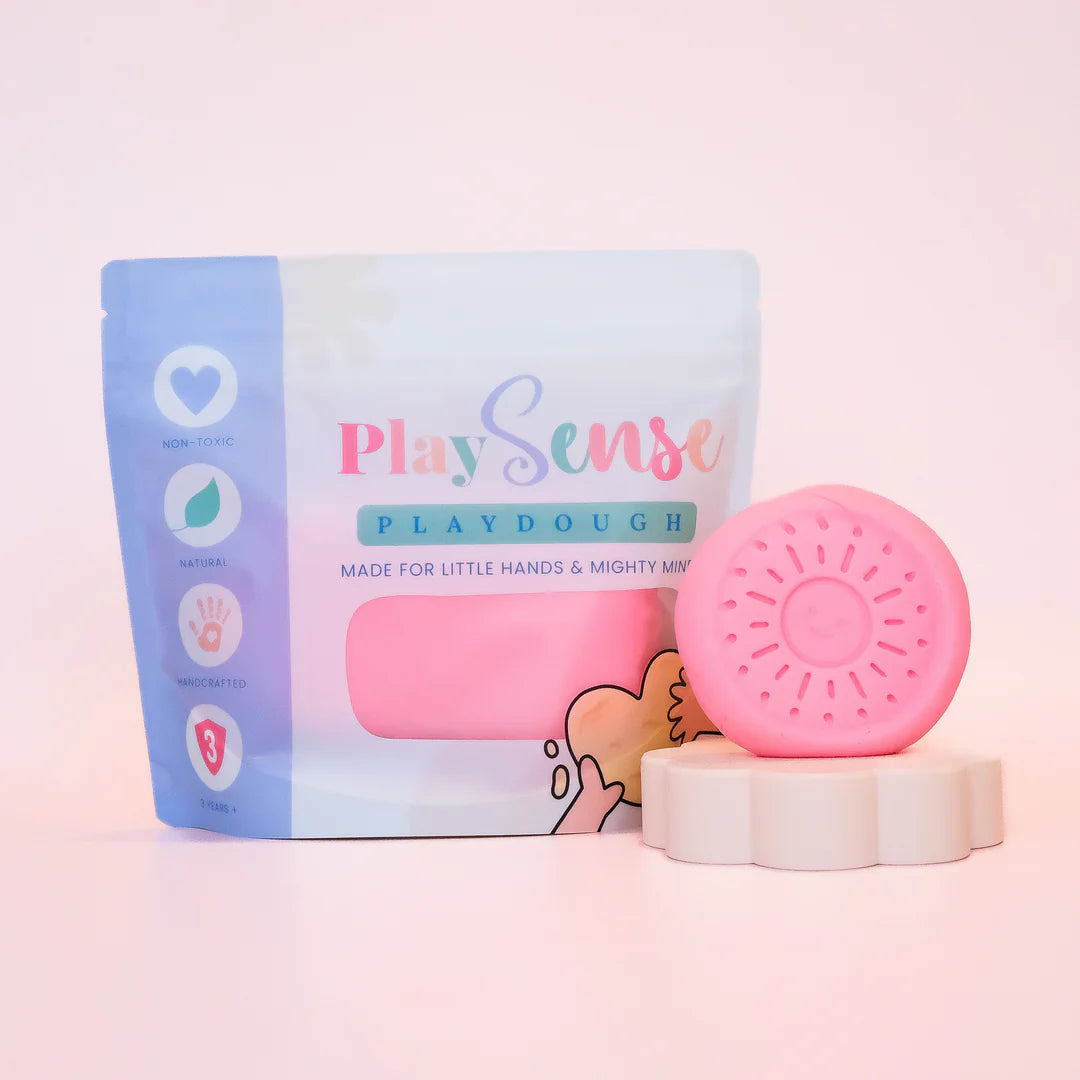 Image of dough by the brand playsense. Great for sensory play and being creative, also fine motor development. Dough is non toxic with all natural ingredients so safe for little hands. Colour and scent is Pastel Pink Cotton Candy