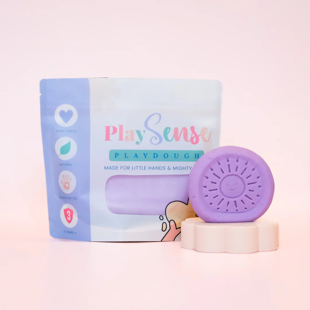 Image of dough by the brand playsense. Great for sensory play and being creative, also fine motor development. Dough is non toxic with all natural ingredients so safe for little hands. Colour and scent is Pastel Purple Bubblegum 